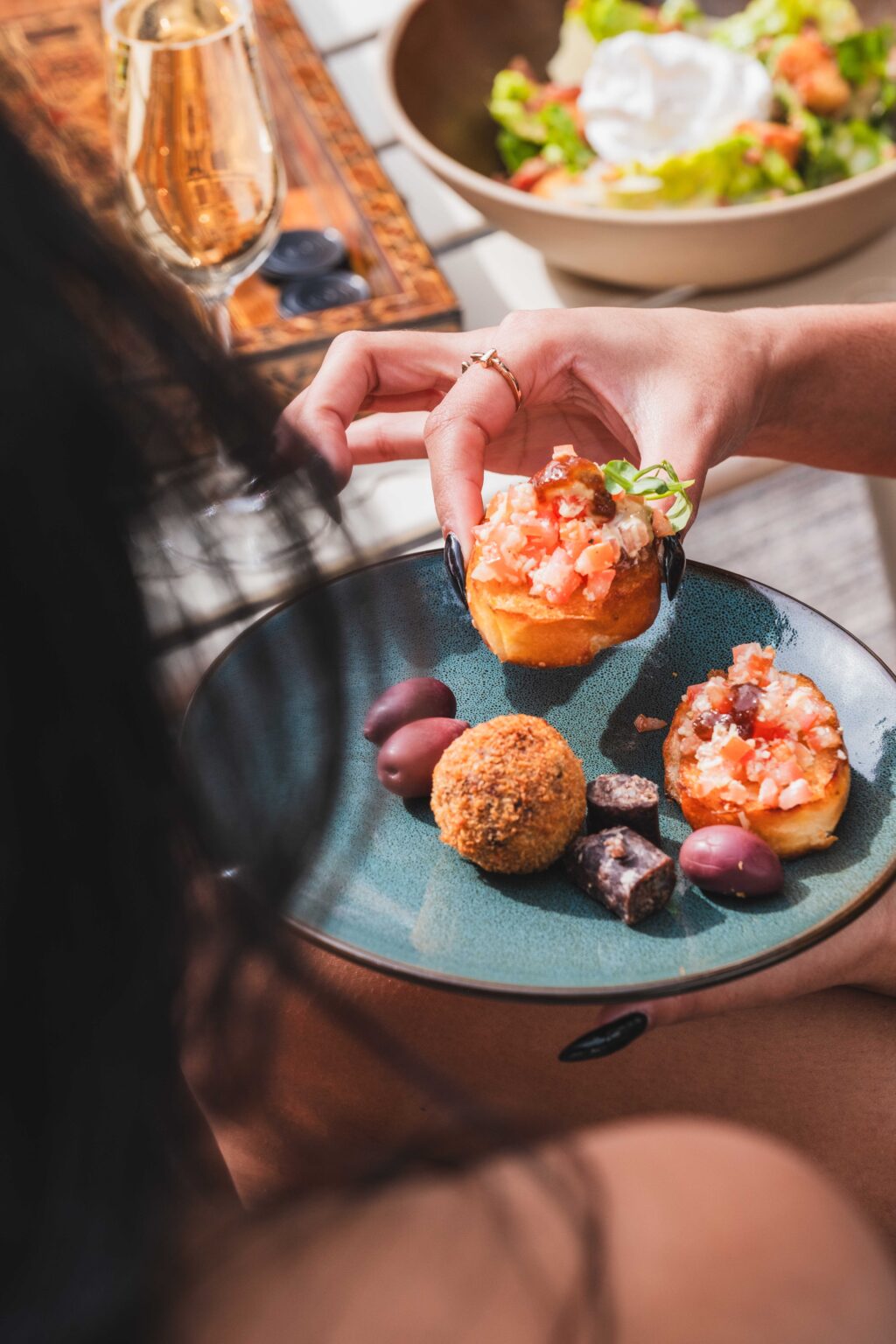 A plate of prawn tostadas and croquettes served at Somewhere Nowhere